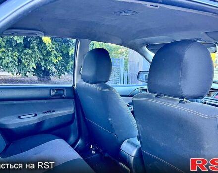 Черный Мицубиси Лансер, объемом двигателя 1.6 л и пробегом 300 тыс. км за 3650 $, фото 8 на Automoto.ua