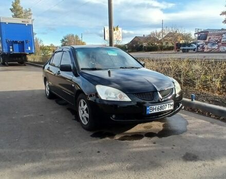 Чорний Міцубісі Lancer, об'ємом двигуна 1.6 л та пробігом 178 тис. км за 2616 $, фото 1 на Automoto.ua