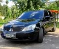 Чорний Міцубісі Lancer, об'ємом двигуна 1.6 л та пробігом 0 тис. км за 4100 $, фото 1 на Automoto.ua