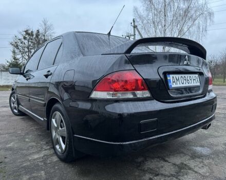 Чорний Міцубісі Lancer, об'ємом двигуна 1.6 л та пробігом 154 тис. км за 5500 $, фото 10 на Automoto.ua