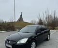Черный Мицубиси Лансер, объемом двигателя 1.6 л и пробегом 200 тыс. км за 3500 $, фото 1 на Automoto.ua