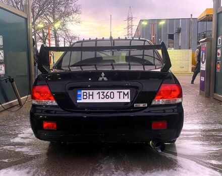 Чорний Міцубісі Lancer, об'ємом двигуна 1.6 л та пробігом 200 тис. км за 4000 $, фото 1 на Automoto.ua