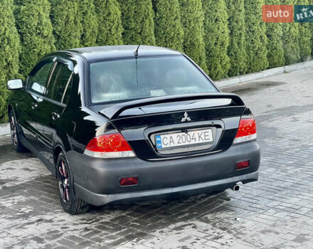Мицубиси Лансер 2005 в Черкассах на Automoto.ua Черный Мицубиси Лансер, объемом двигателя 1.58 л и пробегом 368 тыс. км за 4400 $, фото 17 на Automoto.ua