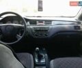 Черный Мицубиси Лансер, объемом двигателя 1.6 л и пробегом 208 тыс. км за 4299 $, фото 7 на Automoto.ua