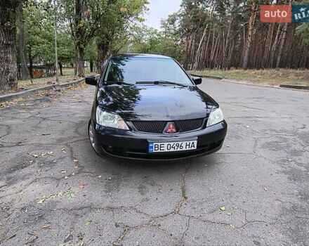 Черный Мицубиси Лансер, объемом двигателя 1.58 л и пробегом 352 тыс. км за 4000 $, фото 7 на Automoto.ua