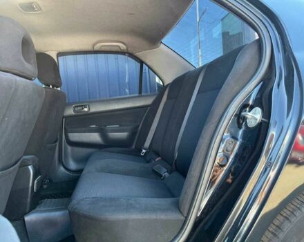 Чорний Міцубісі Lancer, об'ємом двигуна 2 л та пробігом 310 тис. км за 4990 $, фото 9 на Automoto.ua