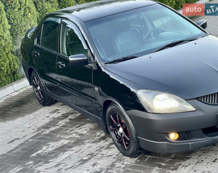 Мицубиси Лансер 2005 в Черкассах на Automoto.ua Черный Мицубиси Лансер, объемом двигателя 1.58 л и пробегом 368 тыс. км за 4400 $, фото 13 на Automoto.ua