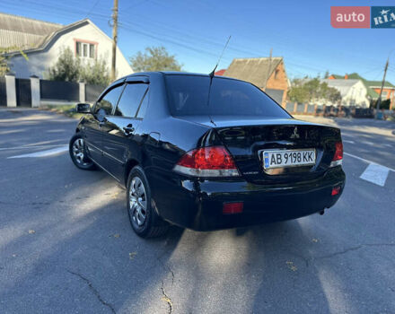 Мицубиси Лансер 2005 в Виннице на Automoto.ua Черный Мицубиси Лансер, объемом двигателя 1.6 л и пробегом 261 тыс. км за 4100 $, фото 21 на Automoto.ua