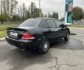 Черный Мицубиси Лансер, объемом двигателя 1.6 л и пробегом 390 тыс. км за 4000 $, фото 4 на Automoto.ua