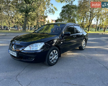 Мицубиси Лансер 2005 в Виннице на Automoto.ua Черный Мицубиси Лансер, объемом двигателя 1.6 л и пробегом 261 тыс. км за 4100 $, фото 27 на Automoto.ua