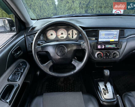 Мицубиси Лансер 2005 в Черкассах на Automoto.ua Черный Мицубиси Лансер, объемом двигателя 1.58 л и пробегом 368 тыс. км за 4400 $, фото 2 на Automoto.ua