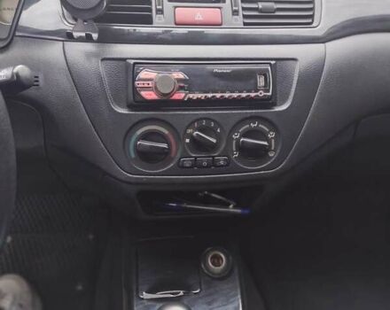 Міцубісі Lancer 2005 у Запоріжжя на Automoto.ua Чорний Міцубісі Lancer, об'ємом двигуна 1.58 л та пробігом 186 тис. км за 4700 $, фото 7 на Automoto.ua