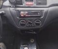 Міцубісі Lancer 2005 у Запоріжжя на Automoto.ua Чорний Міцубісі Lancer, об'ємом двигуна 1.58 л та пробігом 186 тис. км за 4700 $, фото 7 на Automoto.ua