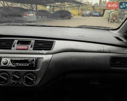 Мицубиси Лансер 2005 в Одессе на Automoto.ua Черный Мицубиси Лансер, объемом двигателя 1.58 л и пробегом 206 тыс. км за 3900 $, фото 17 на Automoto.ua