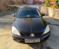 Чорний Міцубісі Lancer, об'ємом двигуна 1.58 л та пробігом 359 тис. км за 3100 $, фото 1 на Automoto.ua