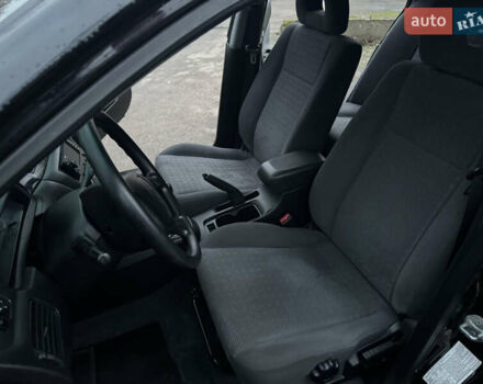 Черный Мицубиси Лансер, объемом двигателя 1.58 л и пробегом 154 тыс. км за 5500 $, фото 27 на Automoto.ua