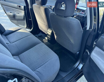 Мицубиси Лансер 2005 в Виннице на Automoto.ua Черный Мицубиси Лансер, объемом двигателя 1.6 л и пробегом 261 тыс. км за 4100 $, фото 45 на Automoto.ua