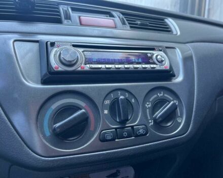 Чорний Міцубісі Lancer, об'ємом двигуна 2 л та пробігом 310 тис. км за 4990 $, фото 23 на Automoto.ua