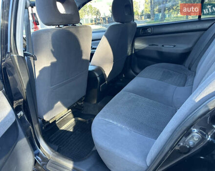 Мицубиси Лансер 2005 в Виннице на Automoto.ua Черный Мицубиси Лансер, объемом двигателя 1.6 л и пробегом 261 тыс. км за 4100 $, фото 42 на Automoto.ua