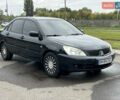 Чорний Міцубісі Lancer, об'ємом двигуна 1.58 л та пробігом 390 тис. км за 4500 $, фото 1 на Automoto.ua