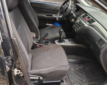 Мицубиси Лансер 2005 в Одессе на Automoto.ua Черный Мицубиси Лансер, объемом двигателя 1.58 л и пробегом 206 тыс. км за 3900 $, фото 13 на Automoto.ua