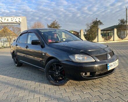 Чорний Міцубісі Lancer, об'ємом двигуна 2 л та пробігом 261 тис. км за 2700 $, фото 13 на Automoto.ua