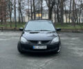 Чорний Міцубісі Lancer, об'ємом двигуна 2 л та пробігом 250 тис. км за 3999 $, фото 2 на Automoto.ua