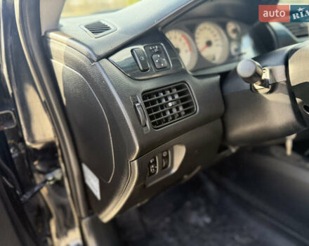 Чорний Міцубісі Lancer, об'ємом двигуна 1.6 л та пробігом 205 тис. км за 3650 $, фото 9 на Automoto.ua