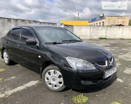 Чорний Міцубісі Lancer, об'ємом двигуна 1.58 л та пробігом 300 тис. км за 3799 $, фото 15 на Automoto.ua