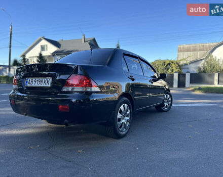 Мицубиси Лансер 2005 в Виннице на Automoto.ua Черный Мицубиси Лансер, объемом двигателя 1.6 л и пробегом 261 тыс. км за 4100 $, фото 9 на Automoto.ua