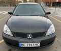 Черный Мицубиси Лансер, объемом двигателя 1.6 л и пробегом 350 тыс. км за 2900 $, фото 3 на Automoto.ua