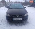 Чорний Міцубісі Lancer, об'ємом двигуна 1.6 л та пробігом 275 тис. км за 2999 $, фото 1 на Automoto.ua