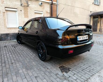 Чорний Міцубісі Lancer, об'ємом двигуна 2 л та пробігом 261 тис. км за 2700 $, фото 1 на Automoto.ua