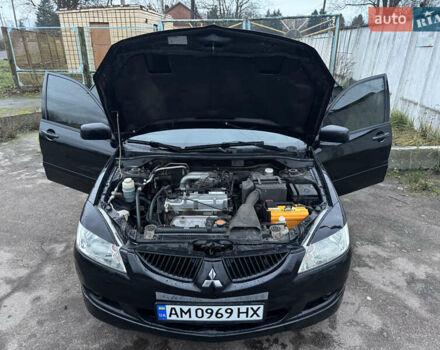 Черный Мицубиси Лансер, объемом двигателя 1.58 л и пробегом 154 тыс. км за 5500 $, фото 20 на Automoto.ua