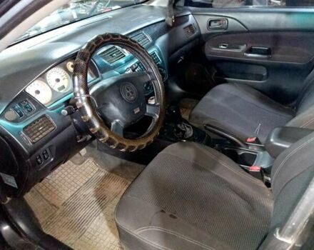 Чорний Міцубісі Lancer, об'ємом двигуна 1.58 л та пробігом 294 тис. км за 3800 $, фото 6 на Automoto.ua