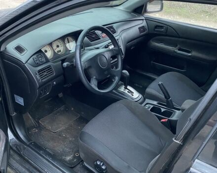 Чорний Міцубісі Lancer, об'ємом двигуна 1.6 л та пробігом 250 тис. км за 3500 $, фото 9 на Automoto.ua