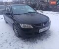 Чорний Міцубісі Lancer, об'ємом двигуна 1.6 л та пробігом 275 тис. км за 2999 $, фото 6 на Automoto.ua