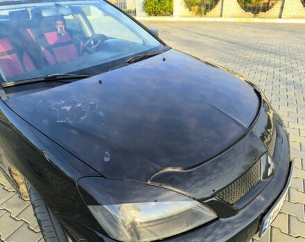 Чорний Міцубісі Lancer, об'ємом двигуна 2 л та пробігом 261 тис. км за 2700 $, фото 7 на Automoto.ua