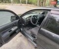 Черный Мицубиси Лансер, объемом двигателя 1.58 л и пробегом 352 тыс. км за 4000 $, фото 2 на Automoto.ua