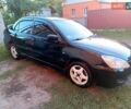 Чорний Міцубісі Lancer, об'ємом двигуна 1.58 л та пробігом 294 тис. км за 3800 $, фото 9 на Automoto.ua