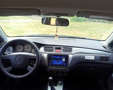 Чорний Міцубісі Lancer, об'ємом двигуна 1.6 л та пробігом 206 тис. км за 3400 $, фото 5 на Automoto.ua
