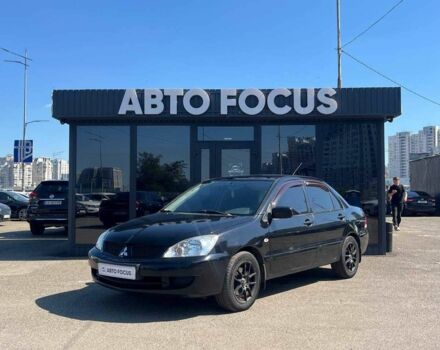 Чорний Міцубісі Lancer, об'ємом двигуна 2 л та пробігом 310 тис. км за 4990 $, фото 3 на Automoto.ua