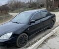 Чорний Міцубісі Lancer, об'ємом двигуна 1.6 л та пробігом 250 тис. км за 3500 $, фото 3 на Automoto.ua
