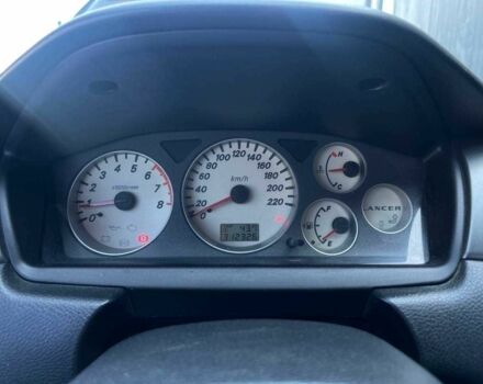 Чорний Міцубісі Lancer, об'ємом двигуна 2 л та пробігом 310 тис. км за 4990 $, фото 19 на Automoto.ua
