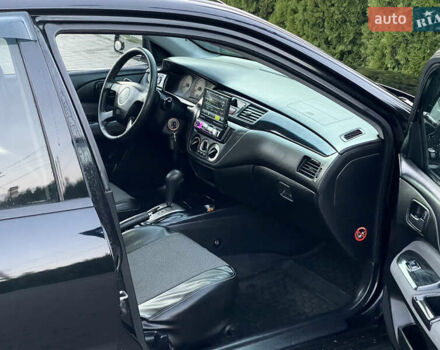 Мицубиси Лансер 2005 в Черкассах на Automoto.ua Черный Мицубиси Лансер, объемом двигателя 1.58 л и пробегом 368 тыс. км за 4400 $, фото 27 на Automoto.ua