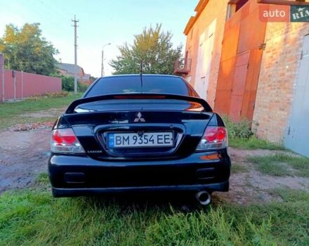Чорний Міцубісі Lancer, об'ємом двигуна 1.58 л та пробігом 294 тис. км за 3800 $, фото 2 на Automoto.ua