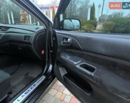 Чорний Міцубісі Lancer, об'ємом двигуна 1.58 л та пробігом 263 тис. км за 4500 $, фото 9 на Automoto.ua