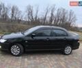 Чорний Міцубісі Lancer, об'ємом двигуна 1.58 л та пробігом 263 тис. км за 4500 $, фото 19 на Automoto.ua