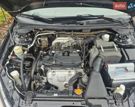 Черный Мицубиси Лансер, объемом двигателя 1.58 л и пробегом 280 тыс. км за 3200 $, фото 14 на Automoto.ua