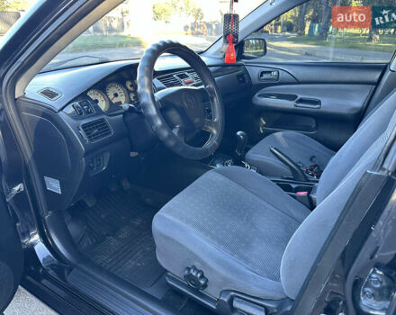 Мицубиси Лансер 2005 в Виннице на Automoto.ua Черный Мицубиси Лансер, объемом двигателя 1.6 л и пробегом 261 тыс. км за 4100 $, фото 34 на Automoto.ua